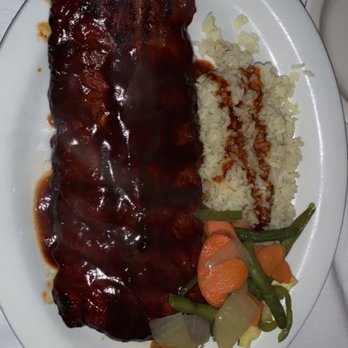 Elegant Bull Restaurant - This is HALF a rack. So tender and satisfying - Steakhouses Near Me - Delhi, California