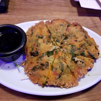 Modoo - Chicken & Noodle Bar - Korean Pancake with seafood option. Size of regular bready pancake. So crunchy. So good. Would eat again!! - Chicken Wings Near Me - Bayside, New York Modoo - Chicken & Noodle Bar - Korean Pancake with seafood option. Size of regular bready pancake. So crunchy. So good. Would eat again!! - Chicken Wings Near Me - Bayside, New York