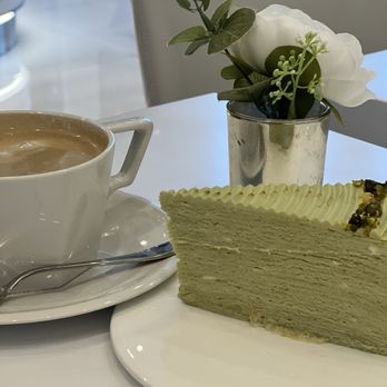 Lady M Cake Boutique - Pistachio cake with cafe latte. - Bakeries Near Me - Las Vegas, Nevada
