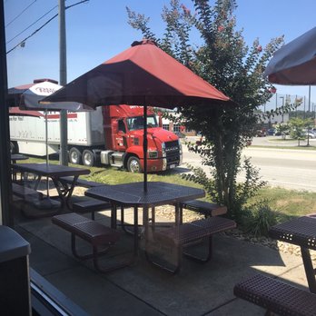 What-A-Burger - Truckers pull up on the side of the road to eat here - you can bet on good greasy spoon grub (outside covered tables) - Burgers Near Me - Prince George, Virginia