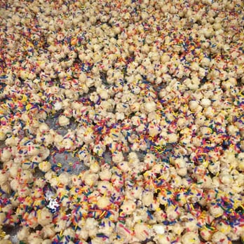 Austin Gourmet Popcorn - Is anyone having a birthday? Birthday Cake popcorn--Vanilla popcorn covered with white chocolate and sprinkles. - Candy Stores Near Me - Austin, Texas