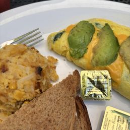 Omlette, cornbread casserole, wheat toast Omlette, cornbread casserole, wheat toast