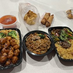 Fire Wok - General Tso's Chicken with Pork fried rice,  Vegetable lo mein, Beef and Broccoli, Crabmeat Rangoon (10), Egg Roll
