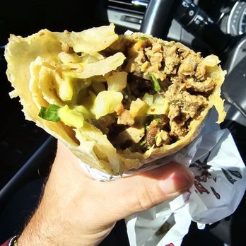 Roberto's Taco Shop - 3rd or 4th bite. Notice anything missing? EXACTLY! PURE CARNE ASADA!!! - Mexican Near Me - Carson City, Nevada