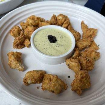 The Peacock - (Partially eaten) BONELESS CRISPY CHICKEN BITES Caviar peppercorn ranch - Breakfast & Brunch Near Me - Charleston, South Carolina The Peacock - (Partially eaten) BONELESS CRISPY CHICKEN BITES Caviar peppercorn ranch - Breakfast & Brunch Near Me - Charleston, South Carolina