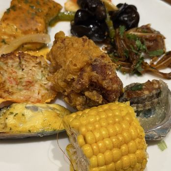 East Bay Buffet - 4/22/26 - Her Plate #1 - Pigs Ear, Abalone, Corn (from Cajun Seafood), Baked Mussel, Baked Scallop, Fried Fish, Fried Chicken Wing - Buffets Near Me - Dublin, California