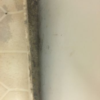 Waiakea Villas Village - Due to poor maintenance and low quality material.  The tile is lifting off the floor in the bathroom. - Condominiums Near Me - Hilo, Hawaii