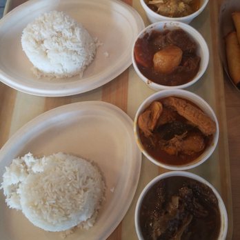 SUBO Filipino Kitchen - Two Lunch Specials - curry, calderata, chicken adobo, and bistec (top to bottom) - Filipino Near Me - Chicago, Illinois SUBO Filipino Kitchen - Two Lunch Specials - curry, calderata, chicken adobo, and bistec (top to bottom) - Filipino Near Me - Chicago, Illinois