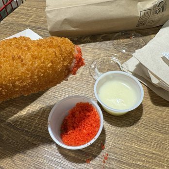 H Mart - Austin - Ok dog all mozzarella with garlic sauce and cheeto dust a must (from food court) - Grocery Near Me - Austin, Texas