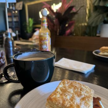 Milk & Honey Coffee Cafe - Breakfast biscuit sandwich with bacon and a large latte. - Coffee & Tea Near Me - Surfside Beach, South Carolina Milk & Honey Coffee Cafe - Breakfast biscuit sandwich with bacon and a large latte. - Coffee & Tea Near Me - Surfside Beach, South Carolina