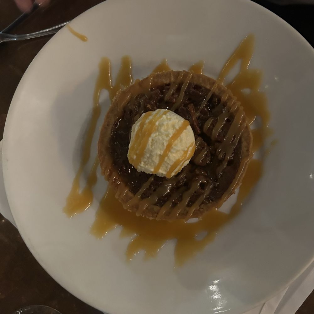 Paradiso Restaurant - The Absolutely Delicious Caramel Pecan Tart with French Vanilla Ice and and Caramel Sauce. - Italian Near Me - Burlington, Ontario Paradiso Restaurant - The Absolutely Delicious Caramel Pecan Tart with French Vanilla Ice and and Caramel Sauce. - Italian Near Me - Burlington, Ontario