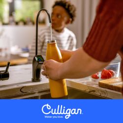 Culligan of Waukesha - Woman filling water bottle using Culligan water