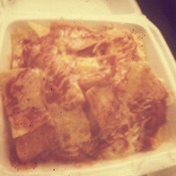 Taco Gringo - a close up of a taco in a styrofoam container - Mexican Near Me - Springfield, Illinois