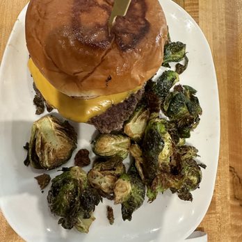 Neighbor's House - Elk burger and fried Brussels Sprouts. - Grocery Near Me - Fort Worth, Texas Neighbor's House - Elk burger and fried Brussels Sprouts. - Grocery Near Me - Fort Worth, Texas