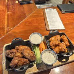 The Tavern - An order of wings. They let you split the flavors, so this is Maple Rosemary and Buffalo.