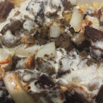 Halal Truck - a meat and cheese pizza in a styrofoam container - Food Trucks Near Me - New York, New York Halal Truck - a meat and cheese pizza in a styrofoam container - Food Trucks Near Me - New York, New York