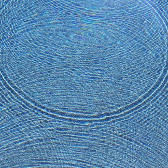 Pioneer Pools - Close-up of the new pebble surface in full sun. - Pool Cleaners Near Me - Tucson, Arizona Pioneer Pools - Close-up of the new pebble surface in full sun. - Pool Cleaners Near Me - Tucson, Arizona