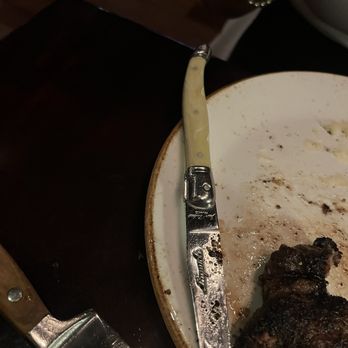D.PRIME Steakhouse - Late picture of a great 14ox ribeye steak. Sorry the best part is missing! - Steakhouses Near Me - Detroit, Michigan D.PRIME Steakhouse - Late picture of a great 14ox ribeye steak. Sorry the best part is missing! - Steakhouses Near Me - Detroit, Michigan