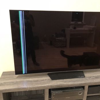 Clutter - This is what happens when you turn on the tv. Just a black screen with that line down the side. - Self Storage Near Me