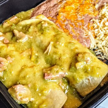 Savina's - Ground Sirloin Enchilada and Brisket Burrito combo covered in Green Chili (takeout) - Mexican Near Me - Denver, Colorado Savina's - Ground Sirloin Enchilada and Brisket Burrito combo covered in Green Chili (takeout) - Mexican Near Me - Denver, Colorado