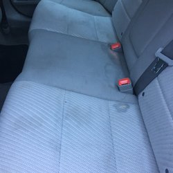 Avis Rent a Car - Back seat was beyond dirty, an orange substance near middle of the seat, by the smell I'm guessing it may have been vomit
