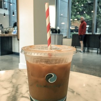 Belle Epicurean Bakery & Catering - Iced white chocolate Americano with FULLY compostable cup and straw - Bakeries Near Me - Seattle, Washington Belle Epicurean Bakery & Catering - Iced white chocolate Americano with FULLY compostable cup and straw - Bakeries Near Me - Seattle, Washington