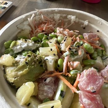 Prime Poké - Poke bowl with avocado. Looks like someone shook it up or took a big bite out of it. - Seafood Near Me - Pleasanton, California