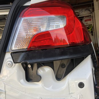 Zane Auto Collision - They replaced the original silver screw with some black one that fit. Again, not original parts. They didn't even try matching it. - Body Shops Near Me - Newark, California