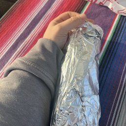 Veggie burrito with mushrooms. The size of a newborn baby!