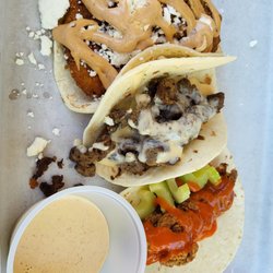 Strange Taco Bar - Fried green tomatoes, steak and cheese, Buffalo chicken tacos