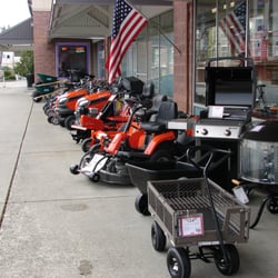 Stanwood Ace Hardware - Our front walk filled with new Weber Grills and Husqvarna Tractors rready for your patio or yard