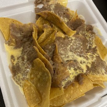 Pepe's Tacos N' Salsa - Soggy nachos with liquid cheese - Mexican Near Me - San Antonio, Texas