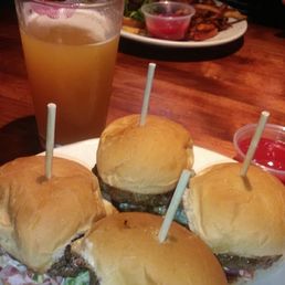 Sliders and Bacon cheeseburger in the background Sliders and Bacon cheeseburger in the background