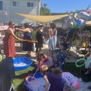 Dee’ Bubbles Kids Party Services - Adults and kids enjoying bubble play - Face Painting Near Me Dee’ Bubbles Kids Party Services - Adults and kids enjoying bubble play - Face Painting Near Me