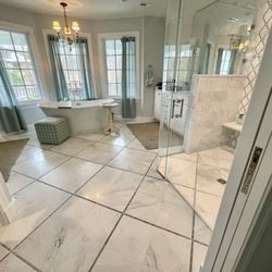 Vallefuoco Contractors - Marble tiled bathroom with custom curbless shower