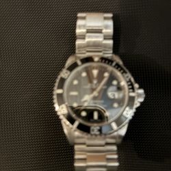 Fakier Jewelers - Rolex Submariner