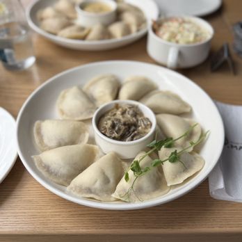 Pierogarnia Mandu - Wild boar with creamy mushroom sauce dumplings - Pierogis Near Me - Gdańsk, PM Pierogarnia Mandu - Wild boar with creamy mushroom sauce dumplings - Pierogis Near Me - Gdańsk, PM