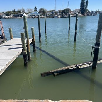Edge Marine Construction - Modified dock with new pilings floating for the boat lift. - General Contractors Near Me - St. Petersburg, Florida Edge Marine Construction - Modified dock with new pilings floating for the boat lift. - General Contractors Near Me - St. Petersburg, Florida