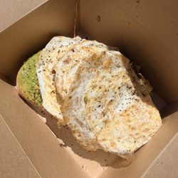 Avocado Toast with 3 over hard fried eggs on top