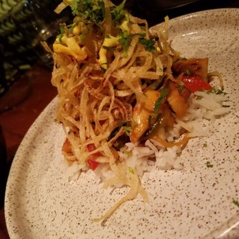 Ruka - Octopus lomo saltado $17- peepers, onion, ginger soy, black rice, shoe string fries - Sushi Bars Near Me - Boston, Massachusetts Ruka - Octopus lomo saltado $17- peepers, onion, ginger soy, black rice, shoe string fries - Sushi Bars Near Me - Boston, Massachusetts