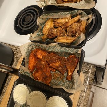 Wingstop - Meal deal for 16pc and two flavors. Lemon pepper and Cajun - Chicken Wings Near Me - Baton Rouge, Louisiana