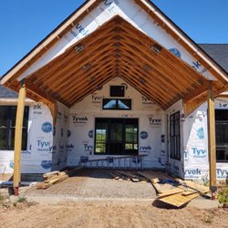 Full House Construction - Covered rear patio during framing