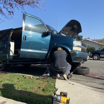 Honest-1 Auto Care - Boyfriend having to replug spark plugs. Would have needed a tow. Would have cost me time and a tow etc - Auto Repair Near Me - Costa Mesa, California