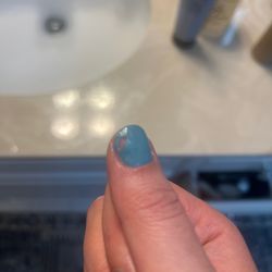 Modish Nail Spa & Salon - Bubbles under gel nails. Now peeling off.