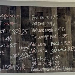 Master Nail - This is the chalk board where they clearly post the cost for services. Very modest and welcomed.