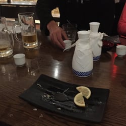 Kyoto Japanese Restaurant - Remnants of the best seaweed salad ever. Saki and 500ml of Sapporo ($10). So far, extremely impressed!