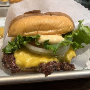 Shake Shack Park and Preston - Single Shackburger, well done with onions added - Burgers Near Me - Plano, Texas Shake Shack Park and Preston - Single Shackburger, well done with onions added - Burgers Near Me - Plano, Texas