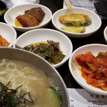 Delicious Table - Lots of side dishes with clam kalgooksoo - Korean Near Me - Buena Park, California Delicious Table - Lots of side dishes with clam kalgooksoo - Korean Near Me - Buena Park, California