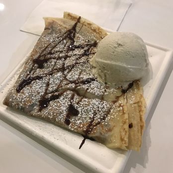 Dulce Crepes - Nutella and caramelized strawberries crepe, topped with powdered sugar and vanilla ice cream. DELICIOUS!!! 2.7.17 - Creperies Near Me - Fairfax, Virginia