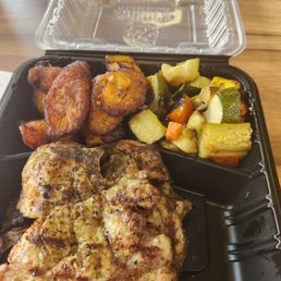 Pork chops with grilled veggies and plantain. Pork chops with grilled veggies and plantain.